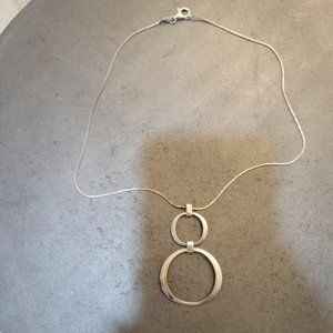 Silver toned double circle pendant necklace
